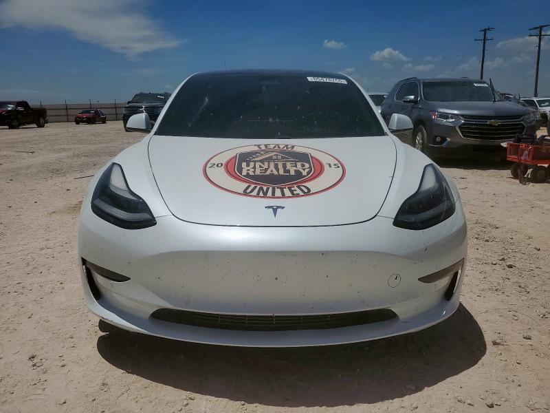 Photo 5 from auction – 2021 TESLA MODEL 3 with VIN 5YJ3E1EBXMF079652