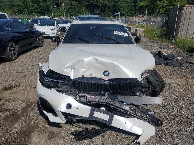 Photo 5 from auction – 2022 BMW 330XI with VIN 3MW5R7J01N8C28148