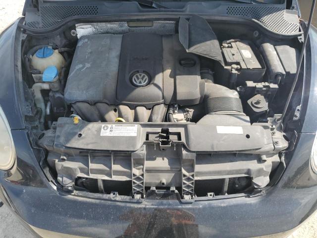 Photo 11 from auction – 2013 VOLKSWAGEN BEETLE with VIN 3VWJX7AT7DM692548