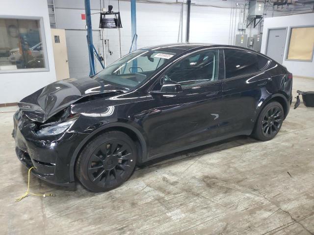TESLA MODEL Y 2023 with VIN 7SAYGDEE4PA042256 - Photo from auction