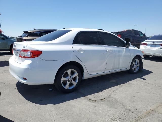 Photo 3 from auction – 2012 TOYOTA COROLLA BASE with VIN 2T1BU4EE6CC779925