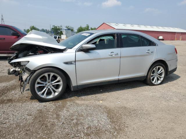 FORD TAURUS SEL 2013 with VIN 1FAHP2E8XDG182494 - Photo from auction