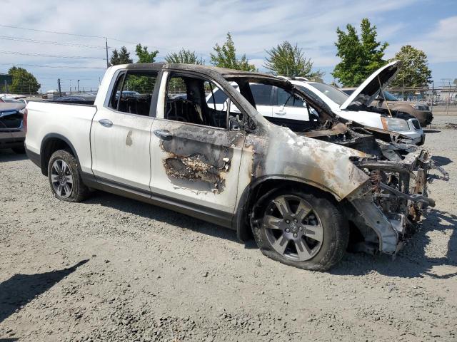 Photo 4 from auction – 2017 HONDA RIDGELINE with VIN 5FPYK3F76HB008286