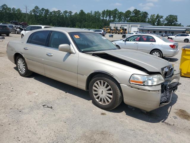 Photo 4 from auction – 2004 LINCOLN TOWN CAR E with VIN 1LNHM81W74Y635499