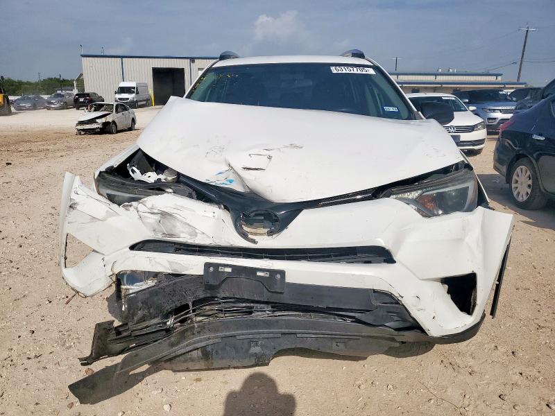 Photo 5 from auction – 2016 TOYOTA RAV4 LE with VIN JTMZFREV5GJ096971