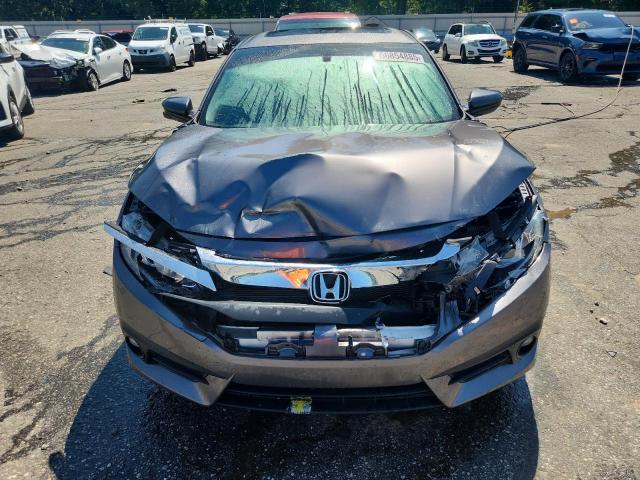 Photo 5 from auction – 2018 HONDA CIVIC EX with VIN JHMFC1F32JX043948
