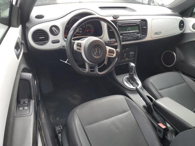 Photo 8 from auction – 2014 VOLKSWAGEN BEETLE with VIN 3VW507AT9EM824037
