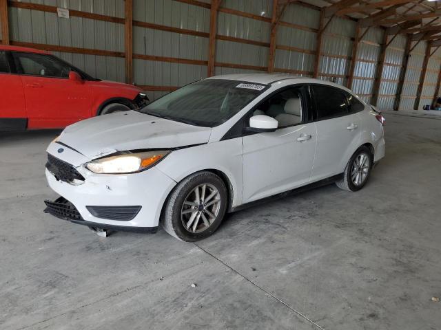 FORD FOCUS SE 2018 with VIN 1FADP3F25JL276994 - Photo from auction