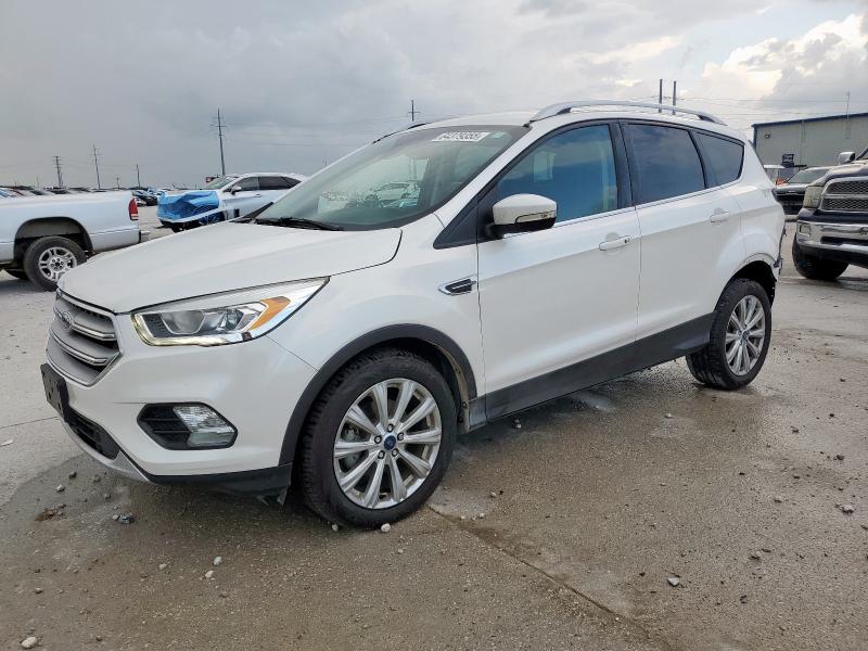 FORD ESCAPE TIT 2017 with VIN 1FMCU0JD1HUC95032 - Photo from auction