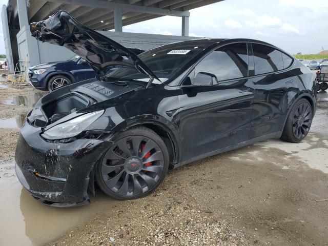 TESLA MODEL Y 2024 with VIN 7SAYGDEF7RF045702 - Photo from auction