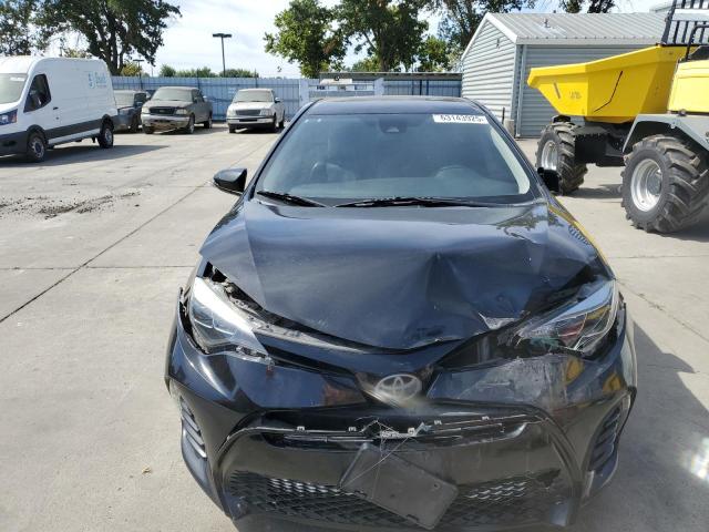 Photo 5 from auction – 2018 TOYOTA COROLLA L with VIN 5YFBURHEXJP746951