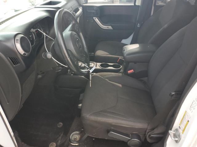 Photo 7 from auction – 2014 JEEP WRANGLER U with VIN 1C4BJWDG5EL304298