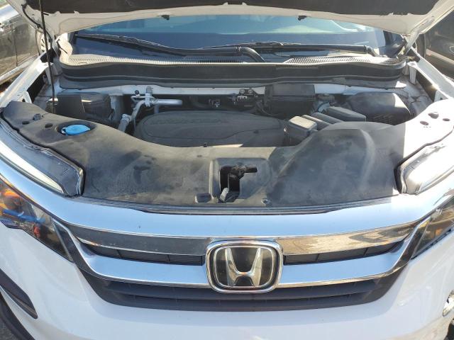 Photo 12 from auction – 2021 HONDA PILOT EXL with VIN 5FNYF5H54MB045464