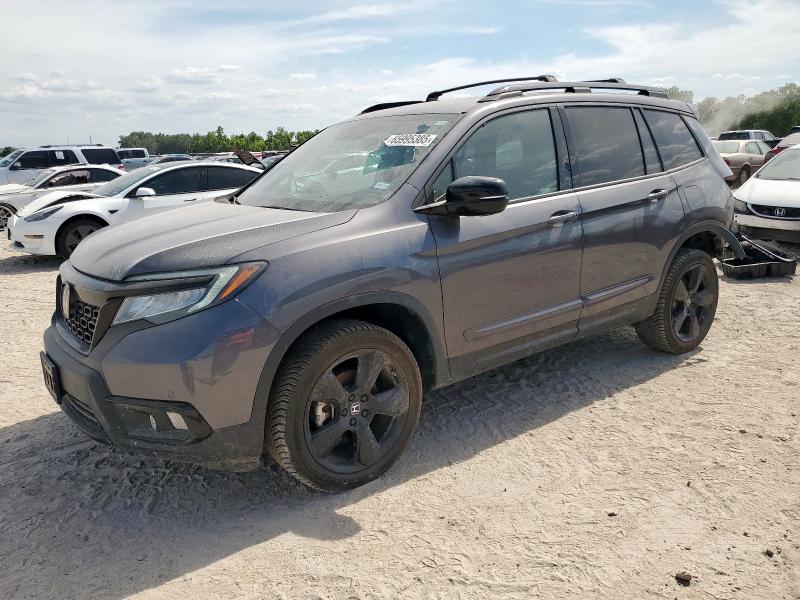 HONDA PASSPORT E 2021 with VIN 5FNYF8H09MB003720 - Photo from auction
