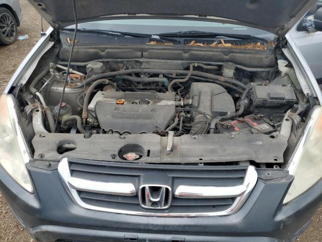 Photo 12 from auction – 2002 HONDA CR-V LX with VIN JHLRD78462C073518
