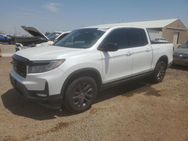 HONDA RIDGELINE 2021 with VIN 5FPYK3F17MB010165 - Photo from auction