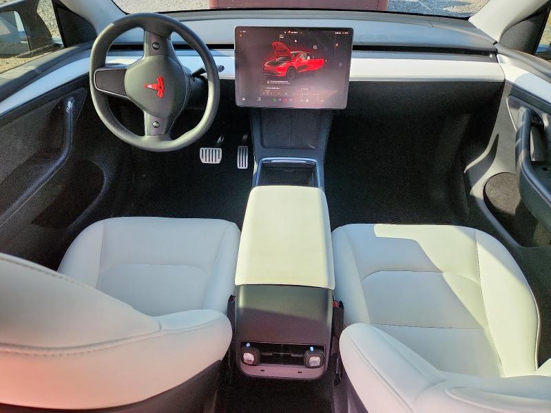 Photo 8 from auction – 2023 TESLA MODEL Y with VIN 7SAYGDEF8PF664810