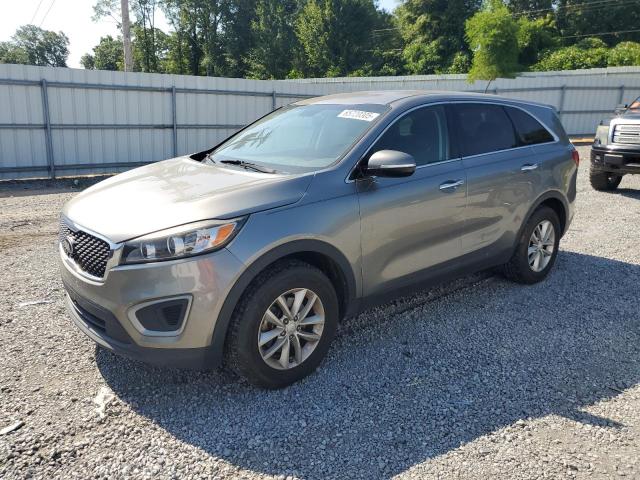 KIA SORENTO LX 2016 with VIN 5XYPG4A30GG040965 - Photo from auction