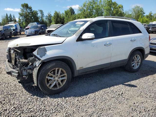 KIA SORENTO LX 2014 with VIN 5XYKTCA65EG475813 - Photo from auction