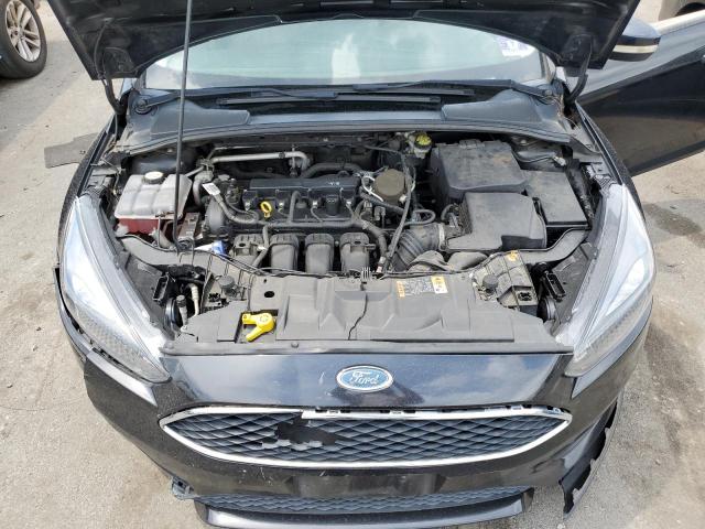 Photo 11 from auction – 2015 FORD FOCUS SE with VIN 1FADP3F22FL321333