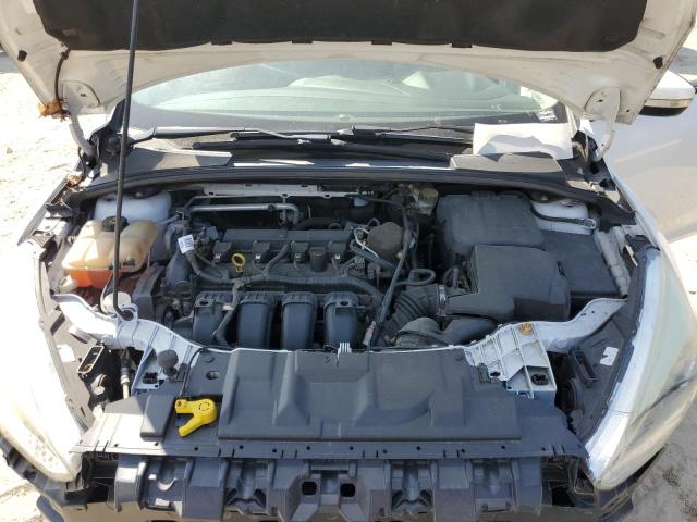 Foto 11 de la subasta – 2015 FORD FOCUS SE con VIN 1FADP3K25FL214069