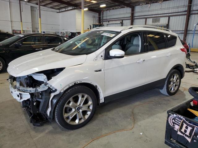 FORD ESCAPE TIT 2016 with VIN 1FMCU0JXXGUC21651 - Photo from auction