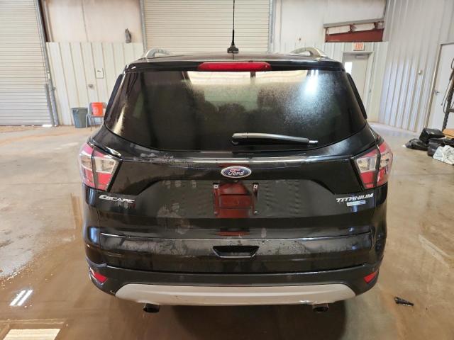 Photo 6 from auction – 2018 FORD ESCAPE TIT with VIN 1FMCU9J98JUD30736