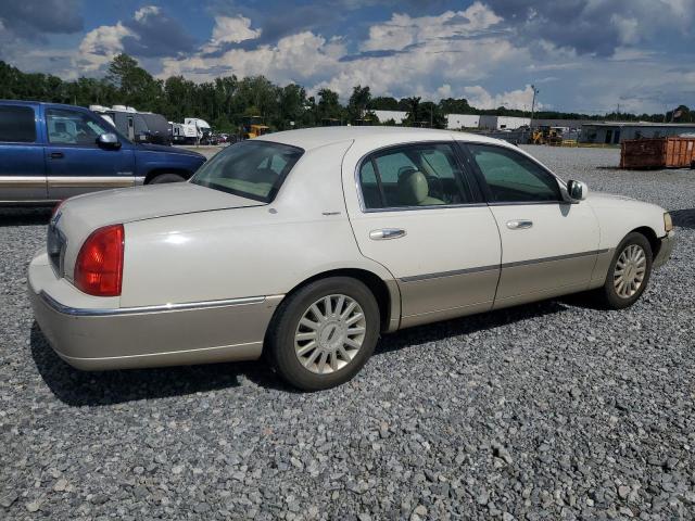 Photo 3 from auction – 2004 LINCOLN TOWN CAR E with VIN 1LNHM81W04Y660213