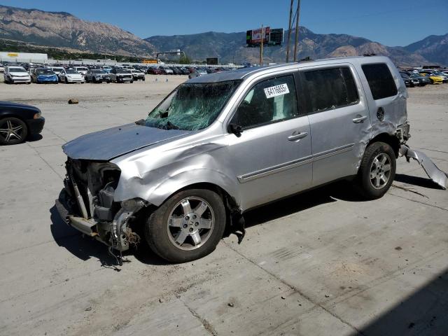 HONDA PILOT TOUR 2011 with VIN 5FNYF4H99BB087882 - Photo from auction