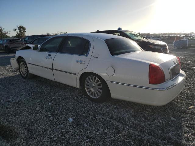 Photo 2 from auction – 2003 LINCOLN TOWN CAR E with VIN 1LNHM81W03Y606246