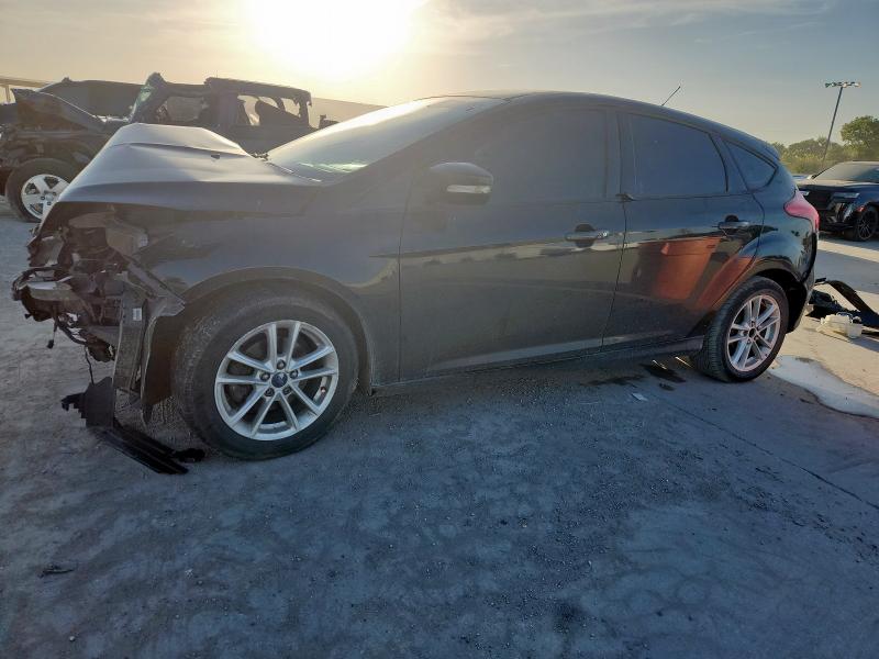 FORD FOCUS SE 2015 with VIN 1FADP3K29FL307371 - Photo from auction