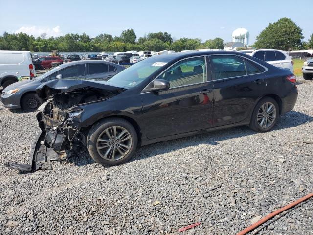 TOYOTA CAMRY LE 2017 with VIN 4T1BF1FK9HU774818 - Photo from auction