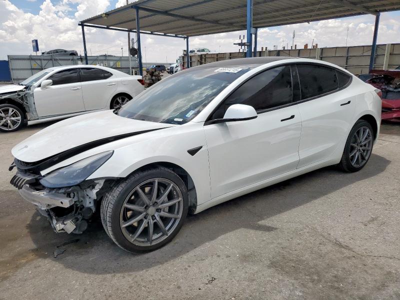 TESLA MODEL 3 2022 with VIN 5YJ3E1EB0NF210136 - Photo from auction