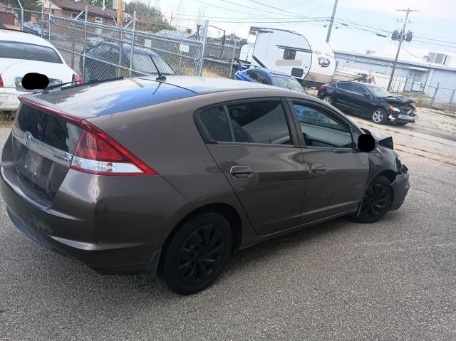 Photo 4 from auction – 2012 HONDA INSIGHT LX with VIN JHMZE2H50CS004626