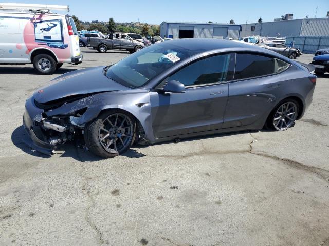 TESLA MODEL 3 2021 with VIN 5YJ3E1EB9MF002318 - Photo from auction