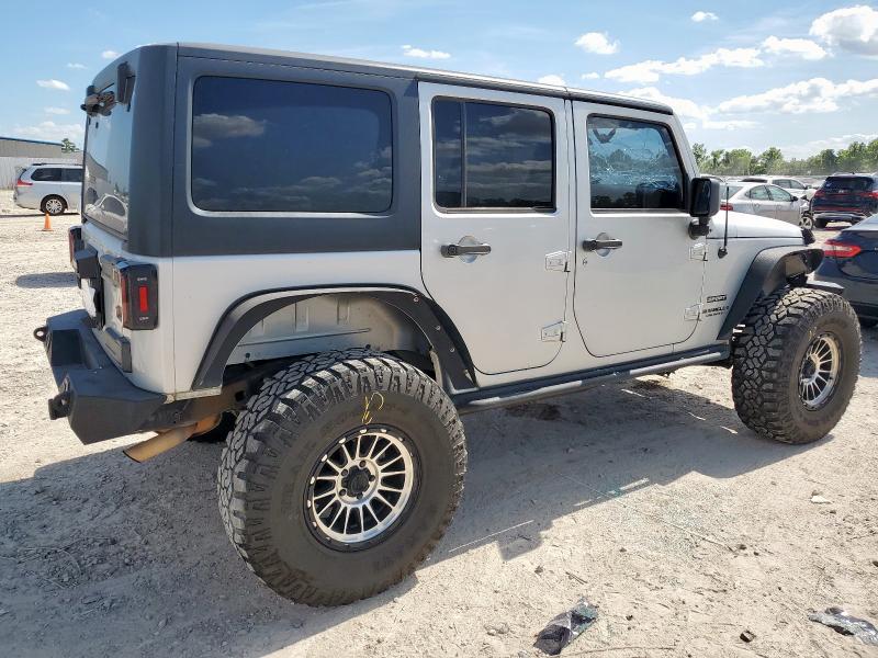 Photo 3 from auction – 2011 JEEP WRANGLER U with VIN 1J4BA3H17BL522155