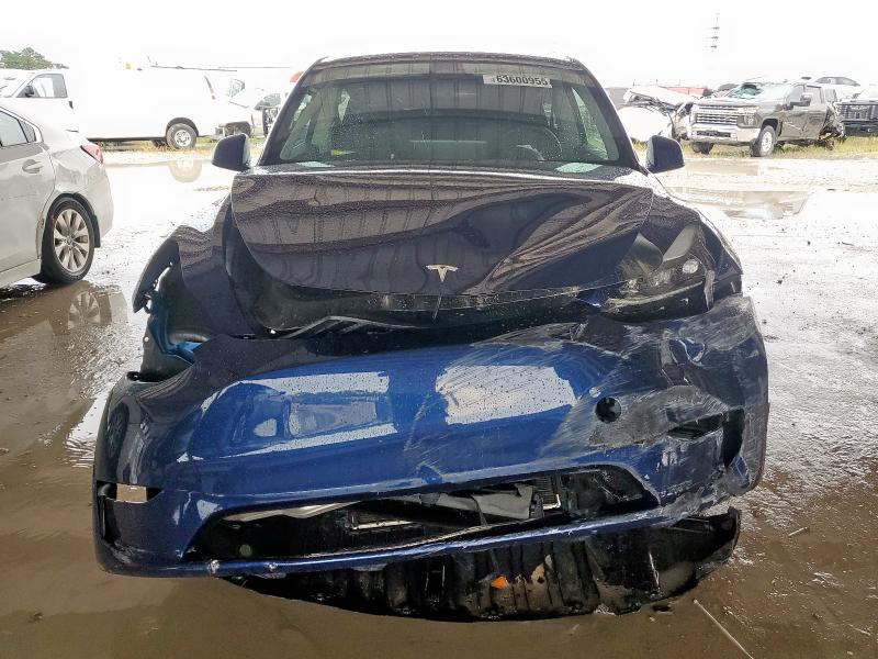 Photo 5 from auction – 2023 TESLA MODEL Y with VIN 7SAYGDEE2PF708890