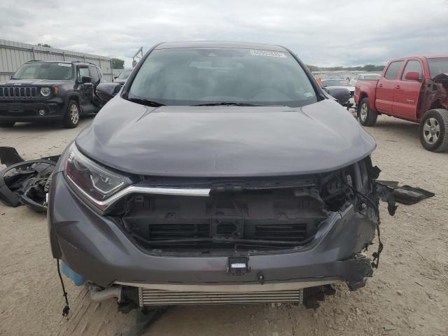 Photo 5 from auction – 2018 HONDA CR-V with VIN 7FARW2H56JE023887