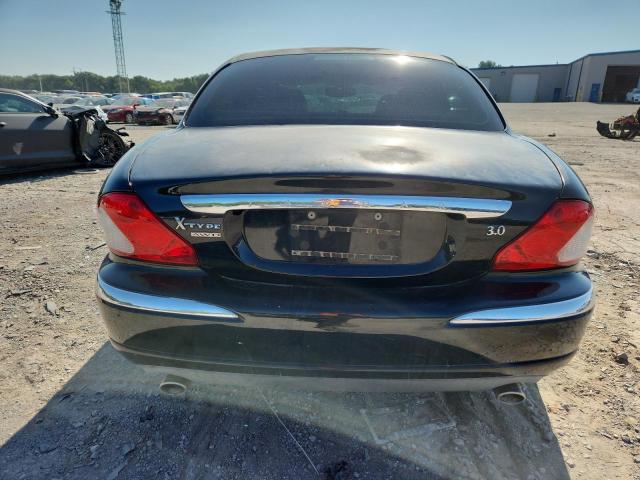 Photo 6 from auction – 2004 JAGUAR X-TYPE 3.0 with VIN SAJEA51CX4WD79444