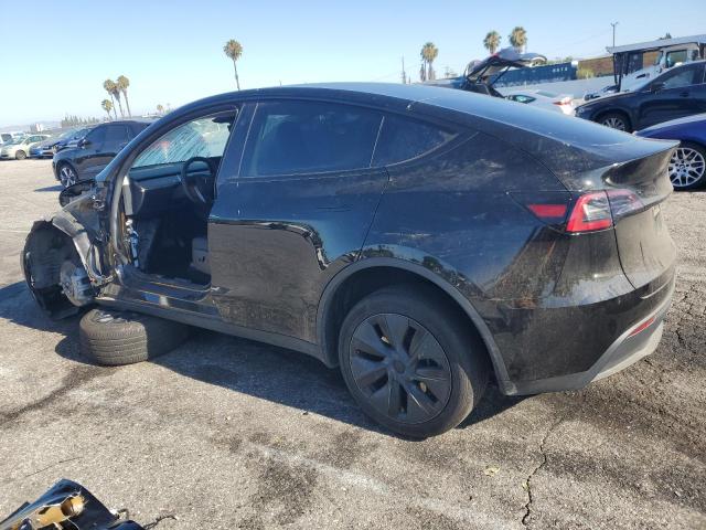 Photo 2 from auction – 2024 TESLA MODEL Y with VIN 7SAYGDED8RF122205