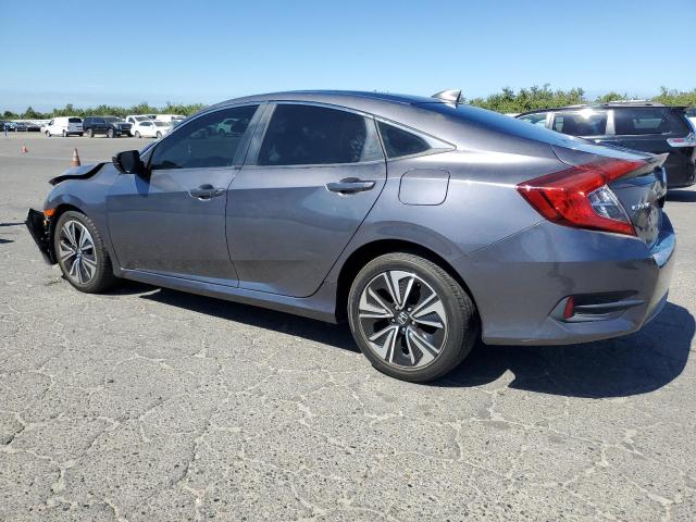 Photo 2 from auction – 2018 HONDA CIVIC EX with VIN JHMFC1F39JX037550