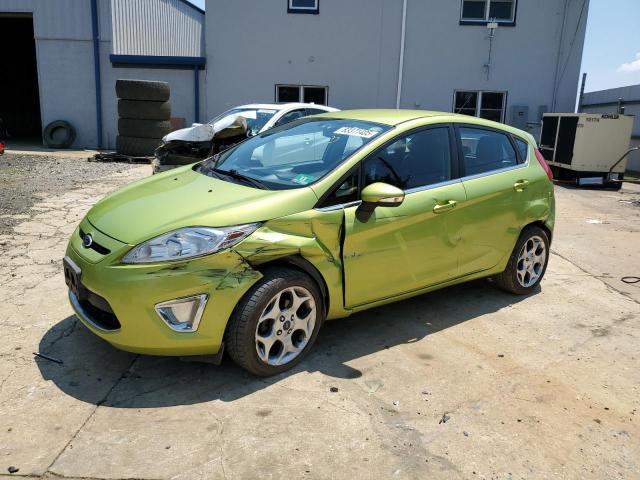 FORD FIESTA SES 2011 with VIN 3FADP4FJ7BM121179 - Photo from auction