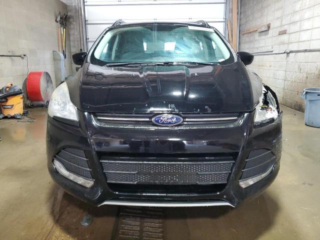 Photo 5 from auction – 2016 FORD ESCAPE SE with VIN 1FMCU9GX1GUC17130
