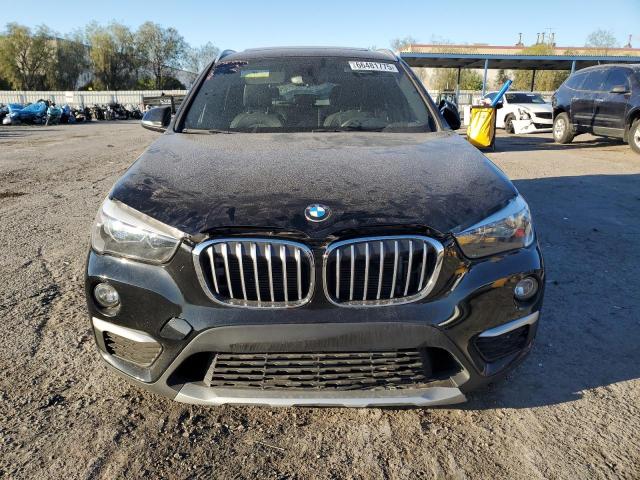 Photo 5 from auction – 2018 BMW X1 with VIN WBXHU7C37J5L06464