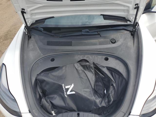 Photo 11 from auction – 2021 TESLA MODEL 3 with VIN 5YJ3E1EB1MF919110