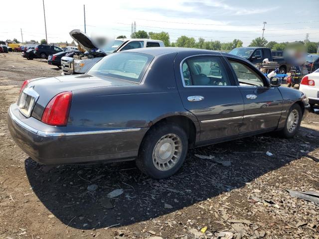 Photo 3 from auction – 2001 LINCOLN TOWN CAR E with VIN 1LNHM81W71Y723044