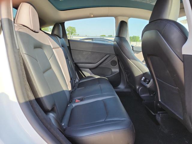 Photo 11 from auction – 2022 TESLA MODEL Y with VIN 7SAYGDEE8NA010312