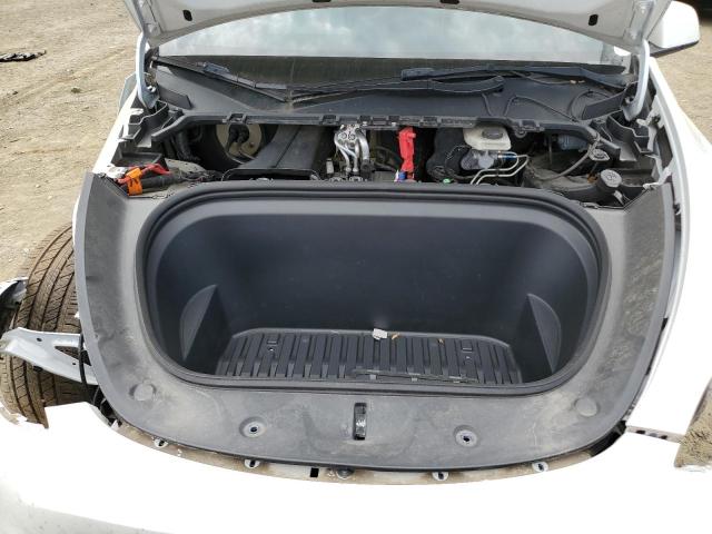 Photo 11 from auction – 2023 TESLA MODEL Y with VIN 7SAYGAEE0PF641124