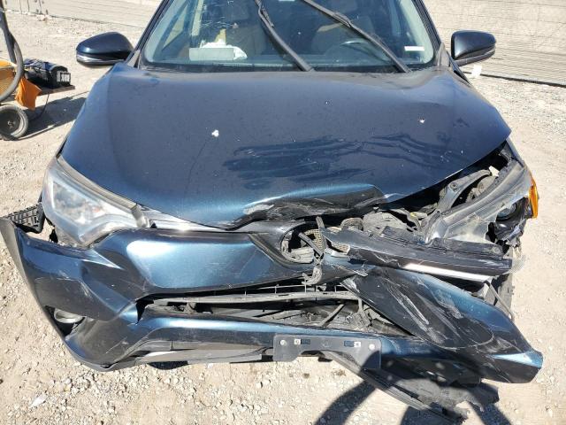 Photo 12 from auction – 2017 TOYOTA RAV4 XLE with VIN JTMWFREVXHD104176