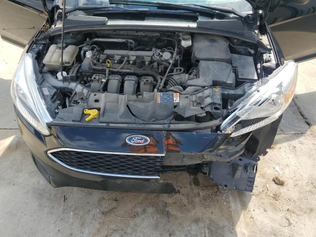 Photo 11 from auction – 2018 FORD FOCUS S with VIN 1FADP3E23JL287056